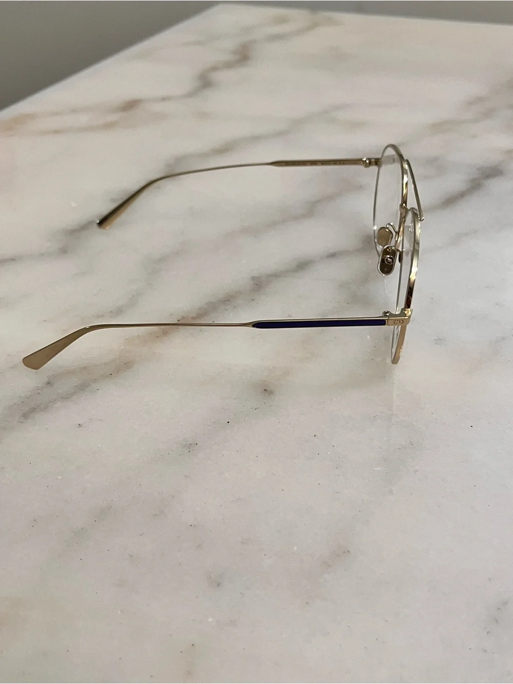 Eyeglasses on Marble Surface